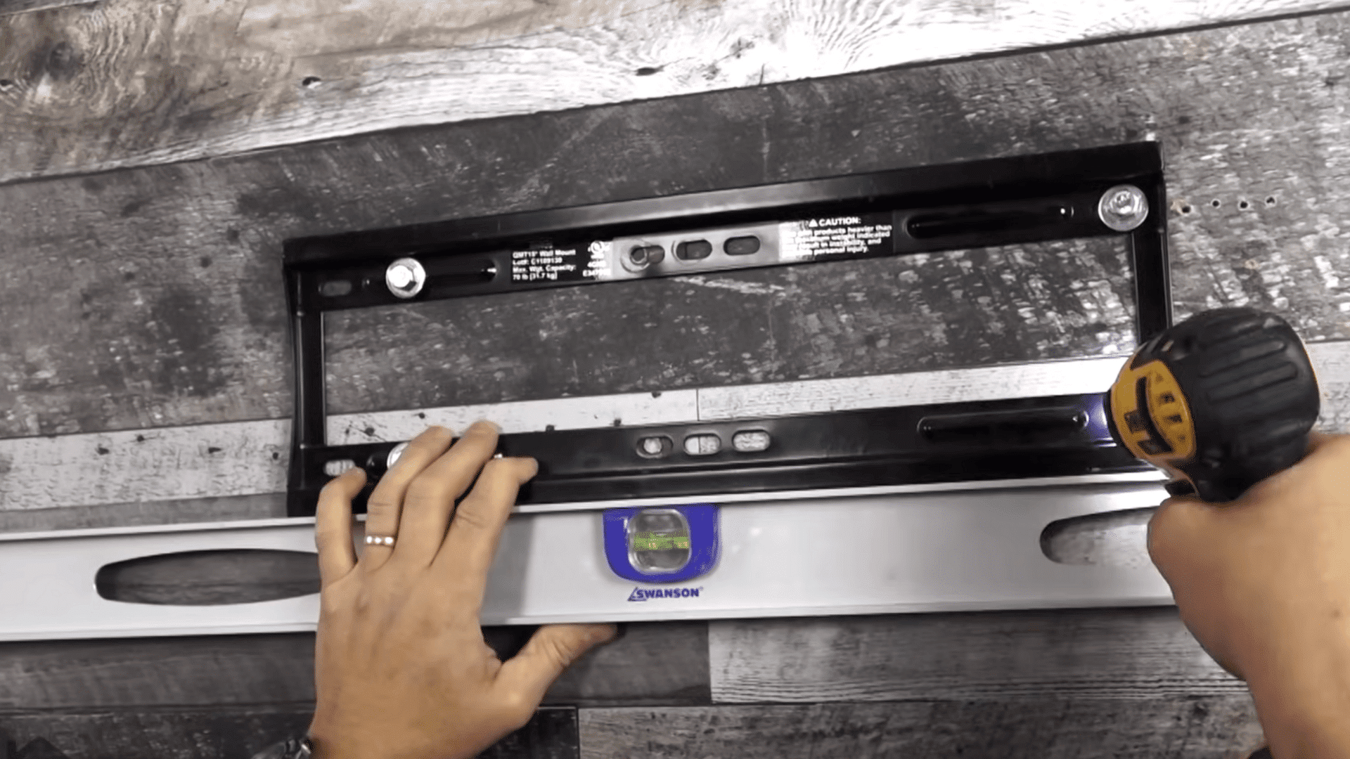 drill lag bolt holes and install the bracket