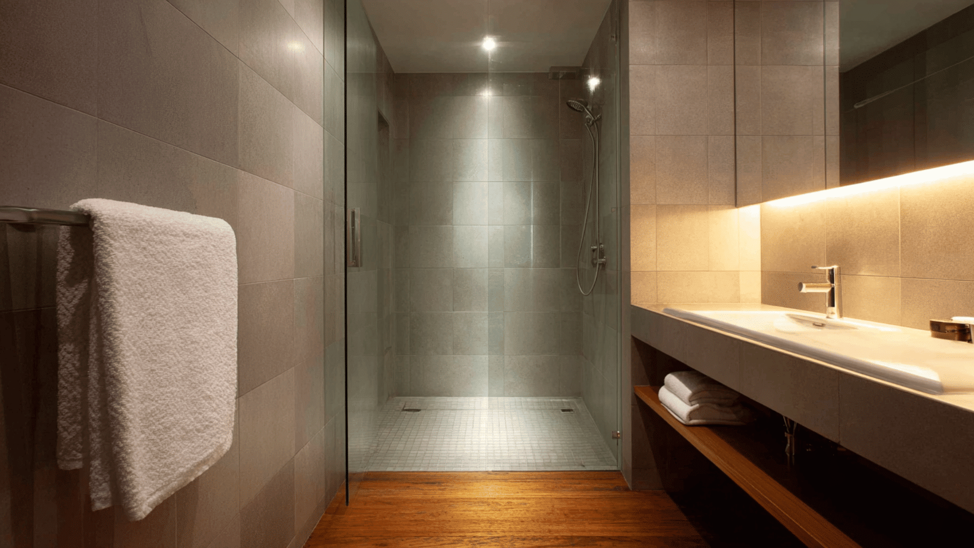 wet room with heated floors and towel bars