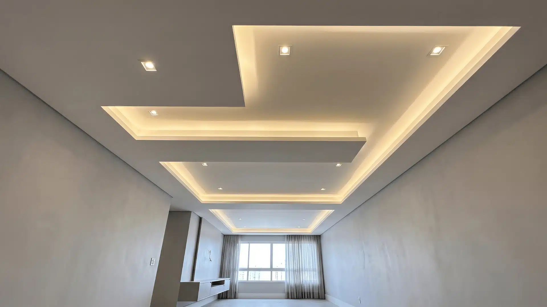 Split-level tray ceiling with staggered recessed sections at different heights.