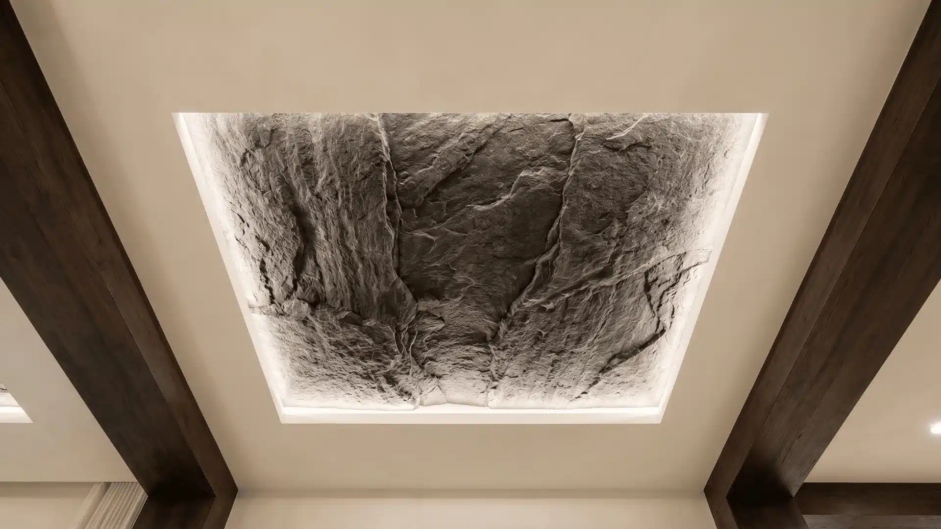 Stone inset tray ceiling featuring textured stone surface inside recessed ceiling area.