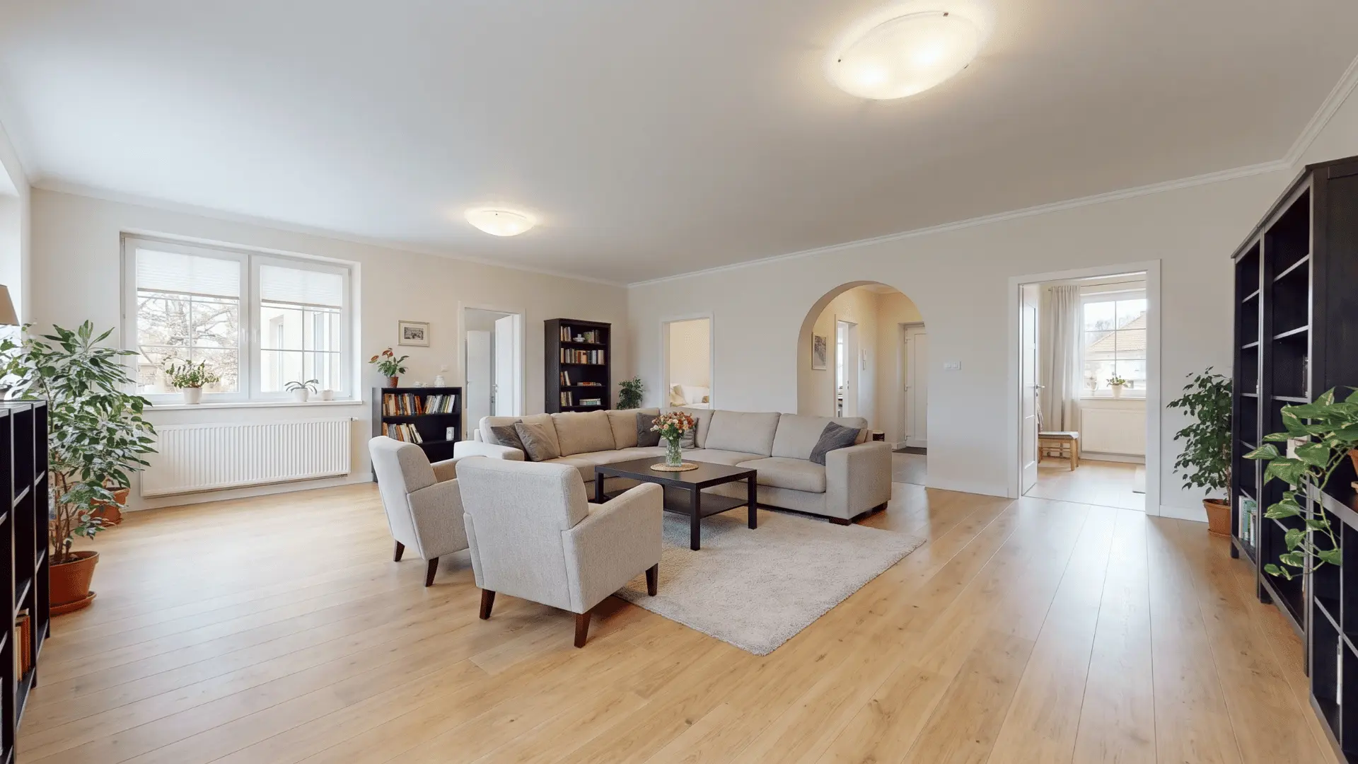  Central seating island allowing movement around all sides of room.