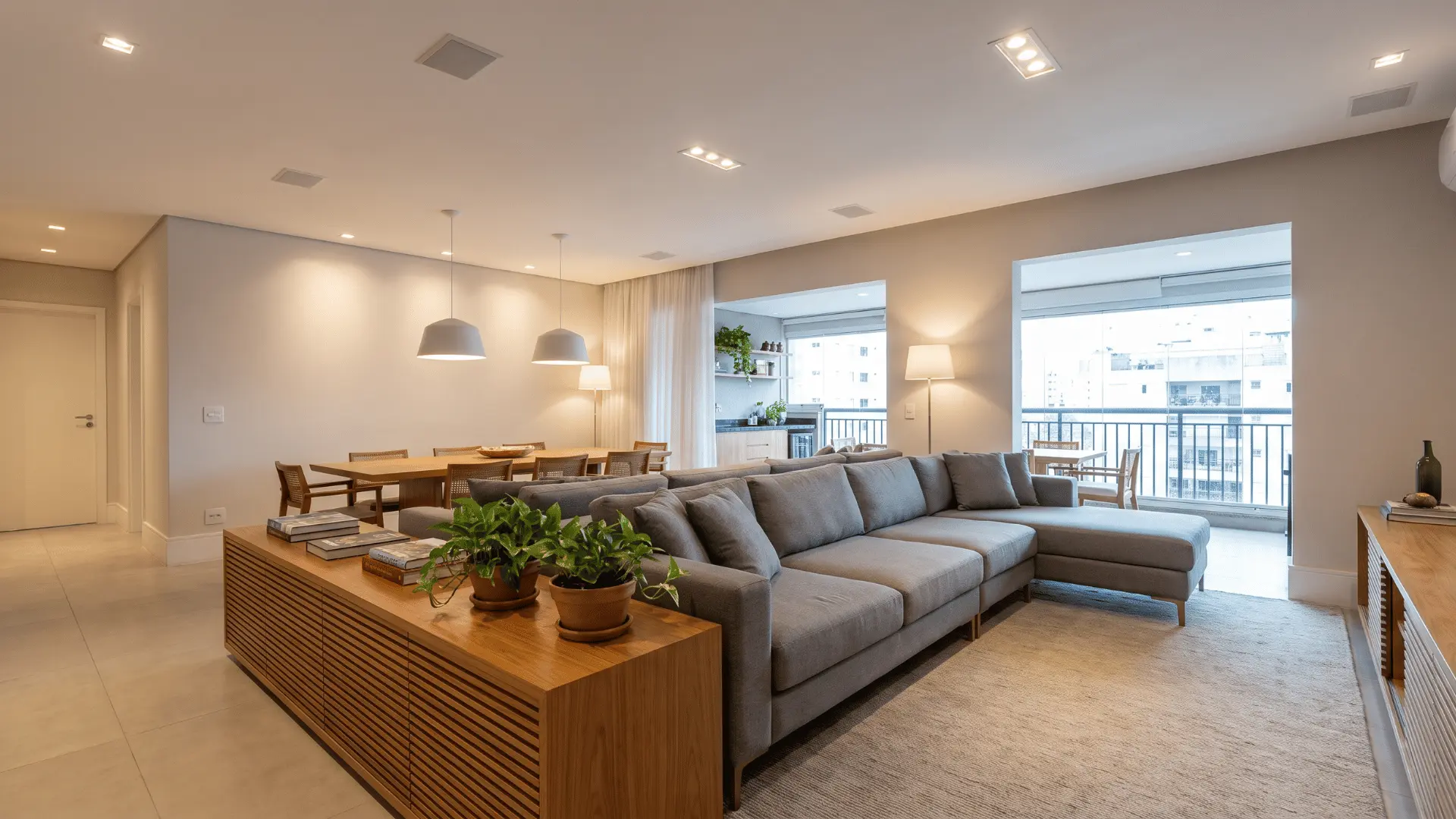  Sofa back used as soft divider between living and dining zones.